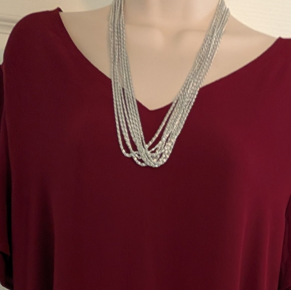 Elegant Silver Eight Strand Necklace By Celebrity.